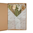 A box of Floriëtte bouquets in brown paper wrapping