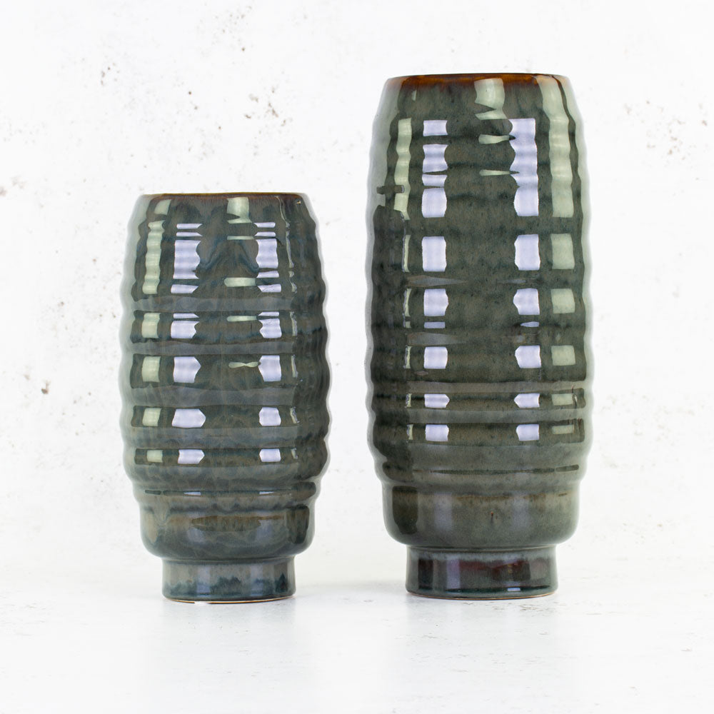 Two green/grey vases in two different heights