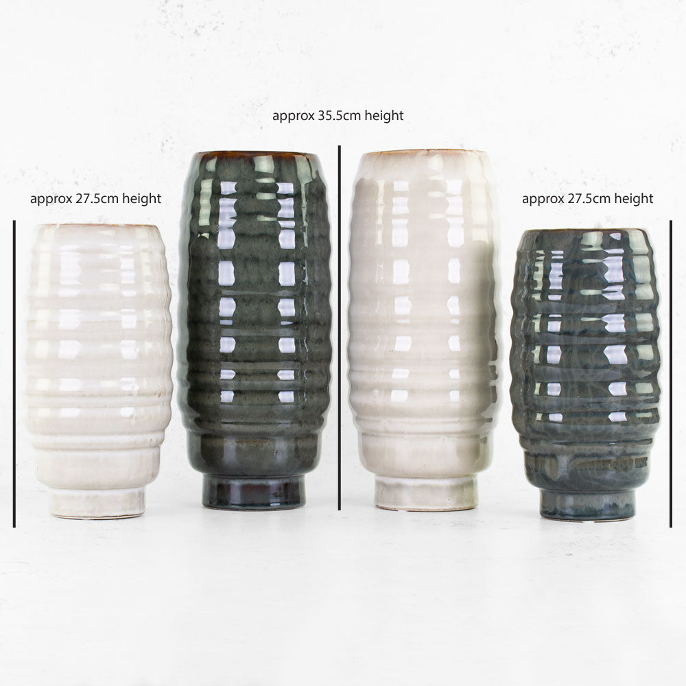 Four vases in two colours and two sizes, green/grey, and creamy beige