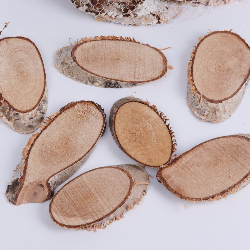 A close up showing natural birch slices, 7-9cm diameter per piece