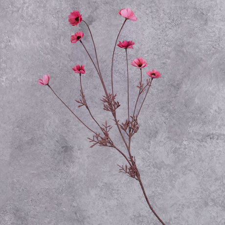 A faux Cosmos flower spray, with pink blooms